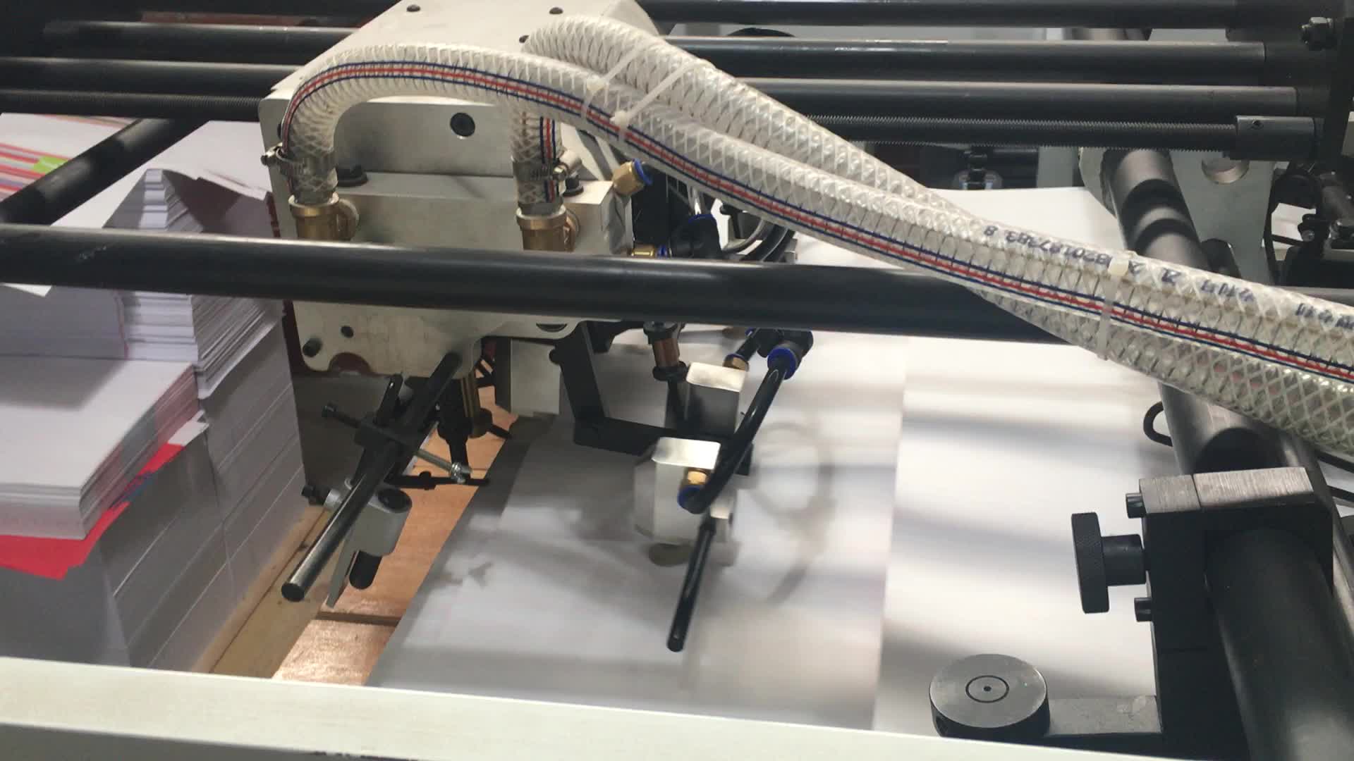 Sheet fed bag making machine-with handles