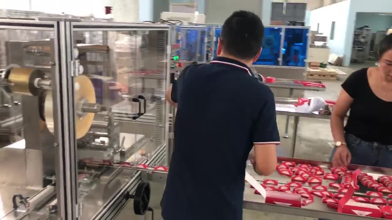 rolling paper overwrapping machine.mp4